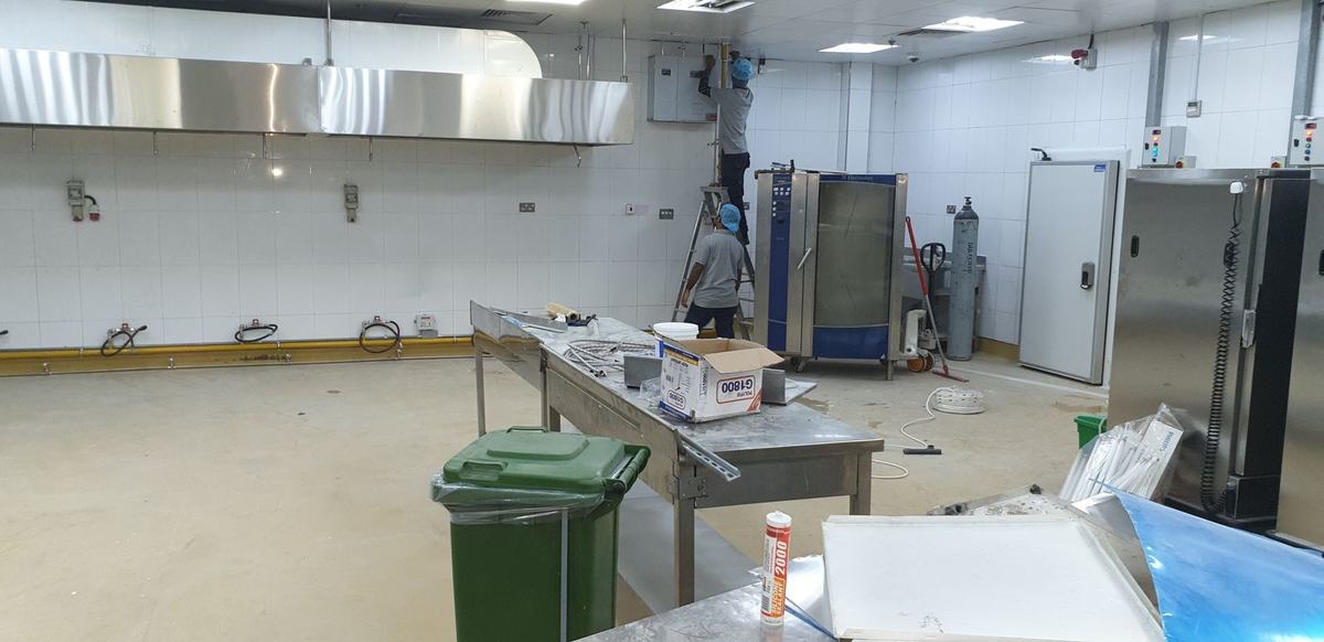 Combi ovens and chiller being installed in a new kitchen